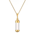 Close-up of golden cylinder perfume bottle pendant with transparent glass and metal cap - SSN-00308 / Gold