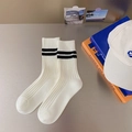 White combed cotton crew socks featuring two black stripes in a minimalist collegiate style - One Size / White with Black Stripes