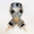 Close-up of gray nylon bag strap with heart patterns and gold-tone metal hooks - No. 17 + Gold Hook (Grey with Black/Gold Heart)