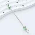 DIY beadable keychain bar with green sphere ornaments on a modern white wavy base - Pale Green