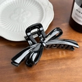 Pince à cheveux nœud noir élégante avec lettrage argenté sur surface en bois - 12.4cm / Noir