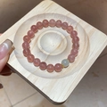 Macro detail of moonstone and strawberry quartz beaded bracelet with gold accents - Bracelet 36#