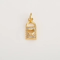 Detailed view of a gold lock pendant with micro-paved zircons and heart cutout - Lock Shape