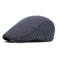 Classic dark navy flat cap with a detailed white micro-check pattern and curved brim - Black Plaid