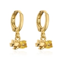 Close-up of gold pig drop earrings with oval yellow gemstone on white background - Pig (Yellow Stone)