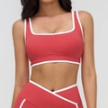 Women's square neck yoga bra and V-cross leggings set in brick red with white trim - Raspberry Red