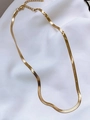 Close-up of golden herringbone snake chain necklace with lobster clasp on white fabric - Gold Blade Chain Necklace