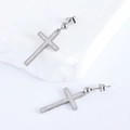 Close-up of silver stainless steel cross earrings with sparkling inlaid crystals - Steel Color (White Zirconia)