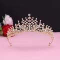 Detailed view of luxury gold bridal crown with crystal leaf patterns and rhinestones - No.9 KC Gold (White Stone)