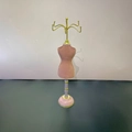Pink velvet mannequin jewelry organizer stand with six gold hooks and a wide base - Wooden Base Mannequin Rack