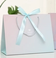 Pink and blue gradient gift bag with silk bow and heart detail for special events - Gradient Blue