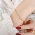 Elegante pulsera de corazón bañada en oro con circonitas en la muñeca de mujer - Pulsera / 15+5cm / Dorado