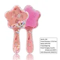 Pink star-shaped detangling hairbrush with colorful flowing sand and cute illustrations - Star Shape Fashion Paris Pink
