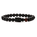 Close-up of beaded Taurus bracelet featuring black agate and a red-brown tiger eye stone - Taurus Red Tiger Eye