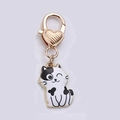 Cute cartoon cat enamel keychain in black and white with a gold heart clasp - Expression Cat Cow Pattern