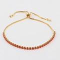 Detail eines vergoldeten Armbandes mit verstellbarem Gleitverschluss und roten Zirkonia - Oranger Zirkon 2,5 mm Armband