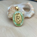Oval Virgin of Guadalupe pendant with green mosaic inlay on a shell background - Green