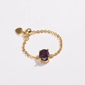 Detail of adjustable gold-plated chain ring with oval purple zircon and heart charm - Purple Zirconia - Gold Plated