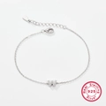 925 sterling silver bracelet featuring a polished letter W zircon pendant in silver - Letter W / White Gold