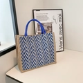 Blue wave pattern tote bag in natural burlap texture with blue woven handles - Blue
