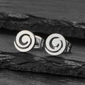 Modern silver stainless steel spiral stud earrings on dark slate stone background - Geometric Spiral Silver