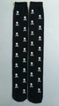 Black over-the-knee socks featuring white skull and crossbones pattern for Halloween - One Size / Small Skull