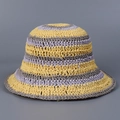 Detailed view of the multi-color striped texture on a woven summer straw sun hat - M (56-58cm) / Yellow