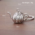 Silver mini moka pot keychain with pumpkin-shaped metal teapot pendant on wooden surface - Coffee Kettle (Silver)