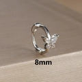 Detailed macro view of 8mm silver butterfly ear cuff with sparkling zircon inlay - 8mm / Silver-White