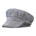 Detalle de la textura tejida azul y blanca de la gorra newsboy de tweed estilo retro - Ajustable / Negro Brillante
