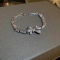 Bracelet nœud en argent avec zircons sur coffret à bijoux gris, style chic - Style 15# Bracelet-Argent Nœud Papillon Patchwork (4972037972305)