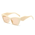 Retro square cat eye sunglasses with beige frames and brown lenses in a 45-degree side view - Beige Frame Champagne Lenses