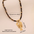 Collier doré avec pendentif homard et cordon léopard tressé avec dimensions du produit - Acier Inoxydable/Polyester / Homard