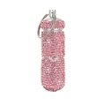 Detailed view of a pink rhinestone-encrusted capsule pill box with a silver key ring - Solid Pink