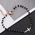Bracciale croce in oro rosa con perle nere sfaccettate e catena estensibile regolabile - Croce Oro Rosa