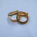 Set of four gold fashion rings featuring two green gem accents and two sleek bands - Spec 7 (Green Gemstone B)