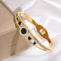 Goldener Herz-Armreif mit schwarzem Emaille und funkelnden Kristallen auf Seide - Herz Schwarze Muschel / Gold