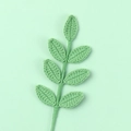 Handmade crochet light green seven-leaf branch on a matching minimalist background - 7 Leaves / Bean Green