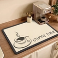 Beige absorbent coffee machine mat with Coffee Time graphic on wooden countertop - Style E-Coffee Cup Graphic