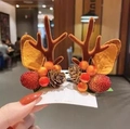 Christmas hair clips featuring brown reindeer antlers with orange ears and red berries - Strawberry & Pine Cone Brown Antlers Pair