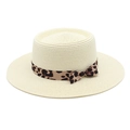 Detailed view of cream straw boater hat featuring a stylish leopard print ribbon and bow - M (56-58cm) / Creamy White
