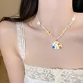 Detailed shot of starfish shell pendant necklace with colorful beads on white lace background - 8# Colorful Dot Shell Necklace