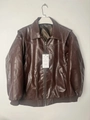 Detalle de chaqueta motera vintage marrón oscuro con costuras en contraste y cremallera - S / Marrón Oscuro