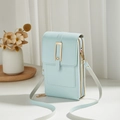 Bolso vertical de color azul claro para móvil hecho de cuero PU con hebilla dorada - Azul claro