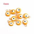 Bright yellow 6mm evil eye charm in stainless steel for DIY jewelry making - 6mm / Orange