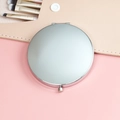 Portable round folding metal makeup mirror in shiny silver finish with pink leather pouch - 70mm / Chrome