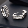 Silver-tone huggie earrings with micro-paved clear cubic zirconia and beaded edges - Double Row Zirconia / White Gold