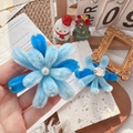 Blue plush flower brooch set with elegant pearls and handmade twisted stem details - Light Blue Fireworks Brooch / One Size
