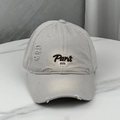Detail of distressed embroidery on vintage beige cotton baseball cap with Paris 1976 design - One Size (58-60cm) / Gray