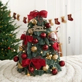 40cm mini artificial Christmas tree with red bows, ornaments, and warm LED light string - Red Acorn Nobilis Pine 40cm